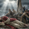Jesus Christ sleeping in a wooden boat while His disciples struggle during a violent storm at sea.